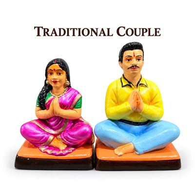 Traditional Couple Figurines on White